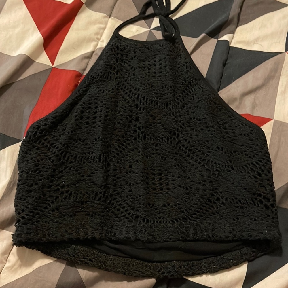 Black crop top good for going to the beach in size XS barley worn like new